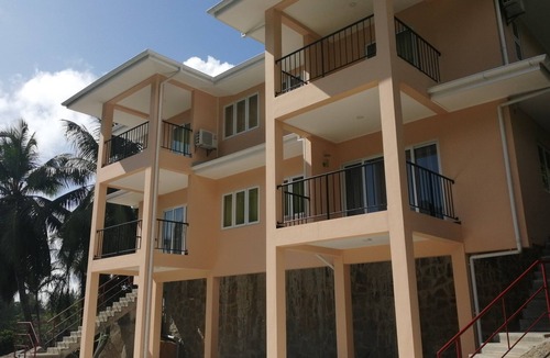 Anse aux Pins Apartment | Peace in Paradise with mountain views and 5 minutes walk to the beach