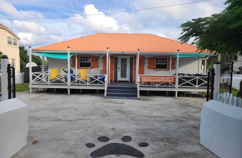 Cockburn Town Villa | Potcake Villa — Stay with Purpose: Support Animal Welfare
