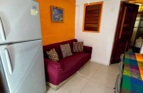 Isla Mujeres Apartment | Private apartment up to 5. A/C, TV, Wi-Fi, fridge, kitchen and living room. Steps from the beach.