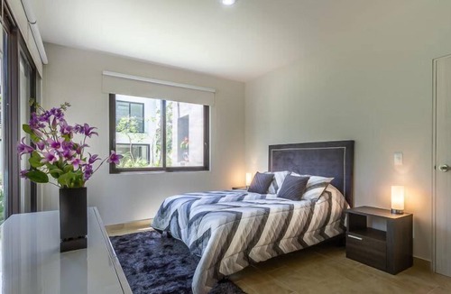 Villa Juarez Condo | Private Patio w/Lagoon View+Pools, Gym, Cafe, Golf