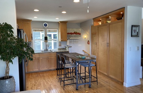 Upper Seabright House | Seabright unique retreat. Townhouse radiant with natural light and decor.