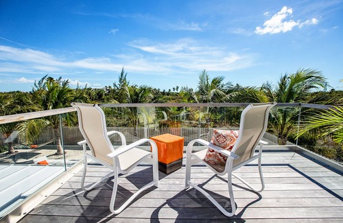 Leeward Settlement Villa | SunsetOne Beach Villa - Golf Cart 6 seats, Kayaks, SUPs; Free Beach Set Up