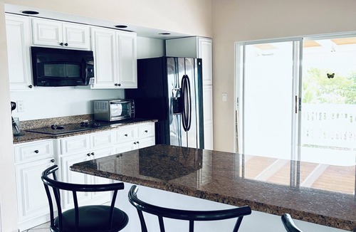 Discovery Bay House | The Flamingo House, Open & Breezy Island Home.minutes from the beach!