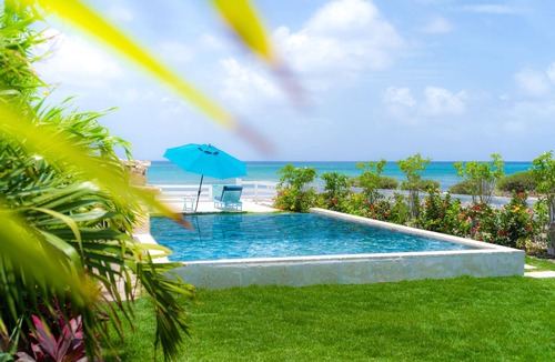 Cockburn Town Villa | Two villas side by side. Each villa has its own jacuzzi and ocean front pool.