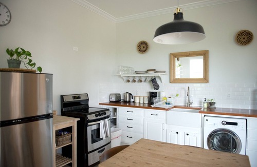 Long Bay Hills Apartment | Very Large Studio & Porch, 5 Min Walk to Beach, Secluded, Tranquil & Green