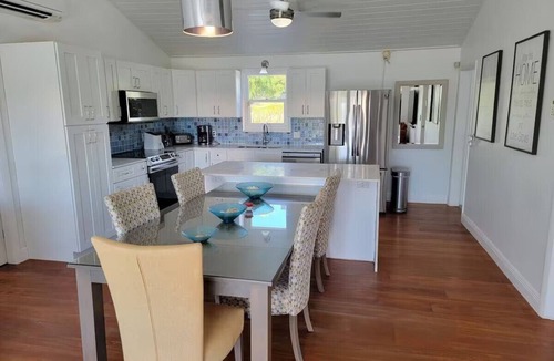 Discovery Bay Villa | Waterfront 5BR Home w/Pool, Gated Parking & Prime Location!
