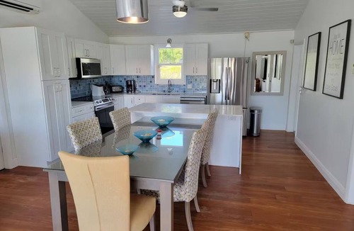 Discovery Bay Villa | Waterfront 3BR Villa w/Pool, Parking & Private Patio