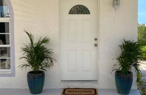 Discovery Bay Villa | Waterfront Villa with Dockside Patio, Paddleboards & Pontoon Boat Rental option