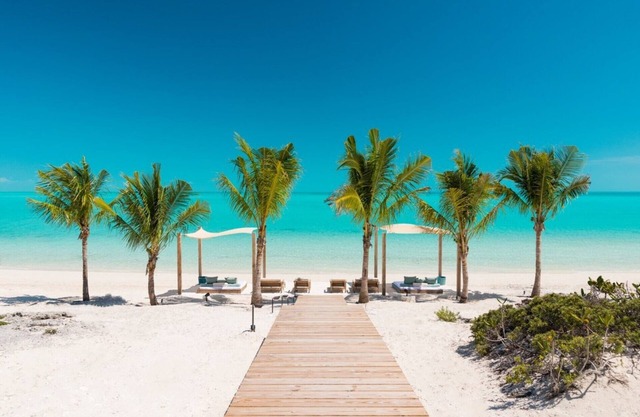Specials available certain weeks. Magnificent 8 bedroom villa on Long Bay Beach