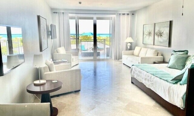 The Bight Condo | Amazing Grace Bay Views, Terraces, Pools & Location! Walk to Beach, Restaurants.