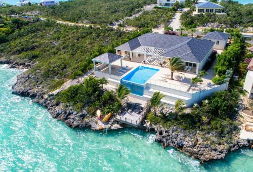 Ocean Point Villa | Crystal Blue Water Front Home with Pool