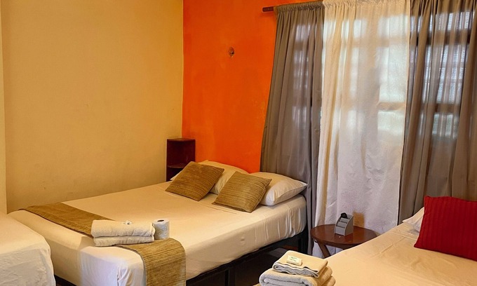 Isla Mujeres Apartment | Private apartment up to 5. A/C, TV, Wi-Fi, fridge, kitchen and living room. Steps from the beach.