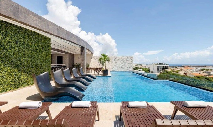 Centro Apartment | Rooftop Infinity Pool | 5th Ave Steps Away