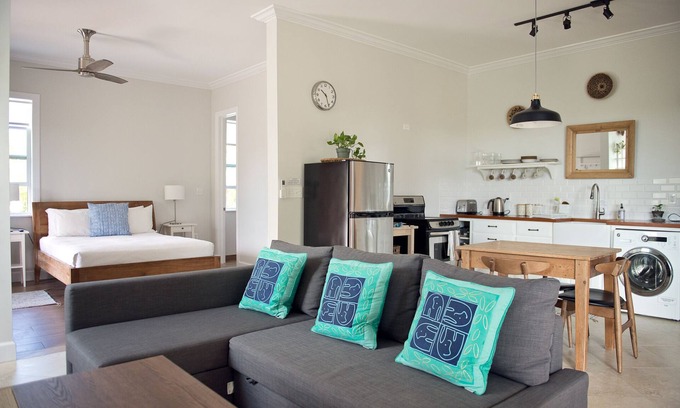 Long Bay Hills Apartment | Very Large Studio & Porch, 5 Min Walk to Beach, Secluded, Tranquil & Green